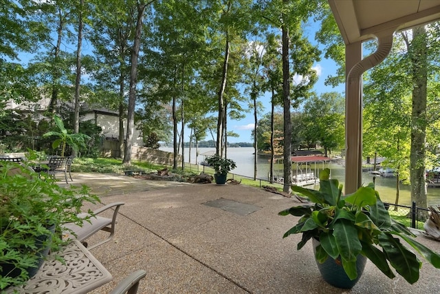 view of patio / terrace with a water view