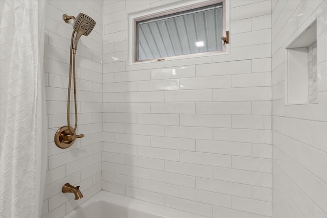 bathroom with shower / bath combo