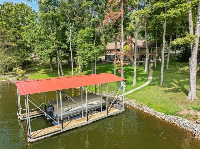 dock area featuring a yard and a water view