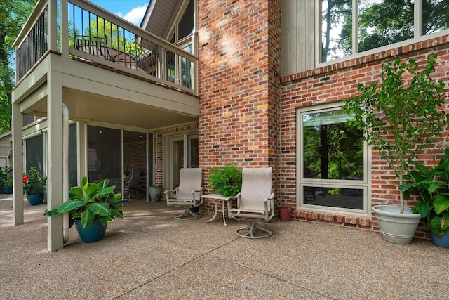 view of patio / terrace with a balcony