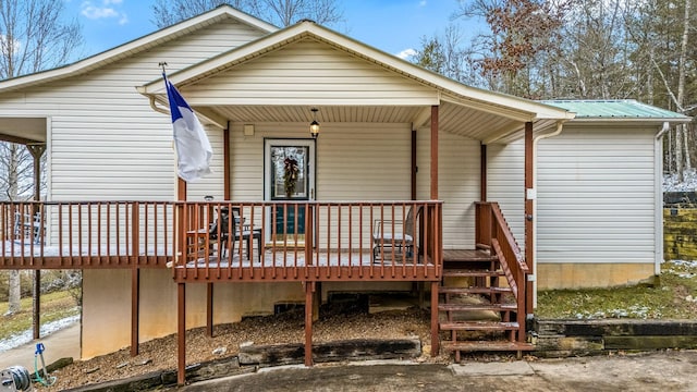 rear view of house with a deck