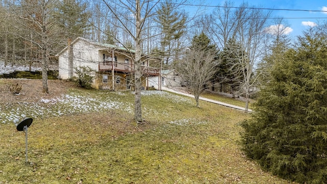 view of yard featuring a wooden deck