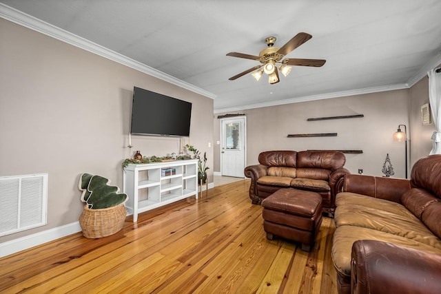 living room with ceiling fan, light hardwood / wood-style flooring, and ornamental molding