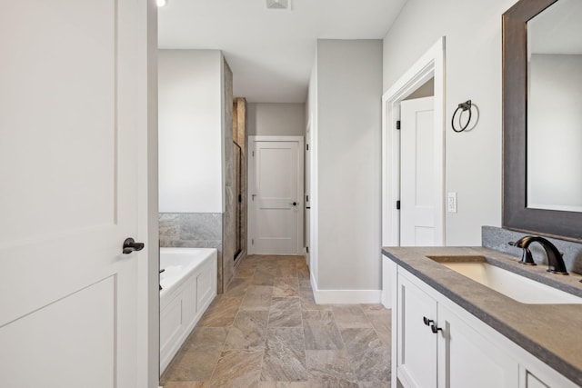 bathroom featuring shower with separate bathtub and vanity