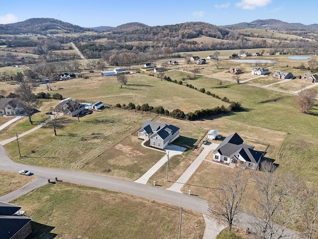 bird's eye view with a mountain view and a rural view