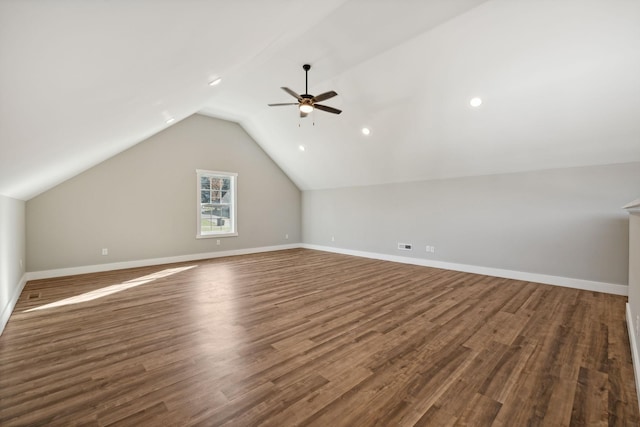 additional living space with ceiling fan, dark hardwood / wood-style flooring, and lofted ceiling