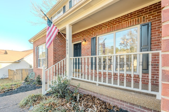 doorway to property with a porch