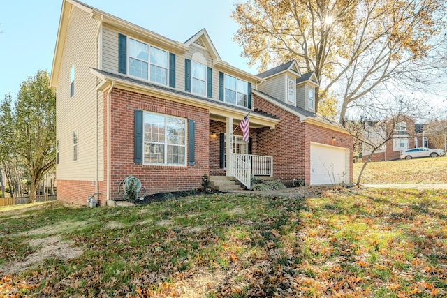 view of front of home with covered porch, a garage, and a front lawn