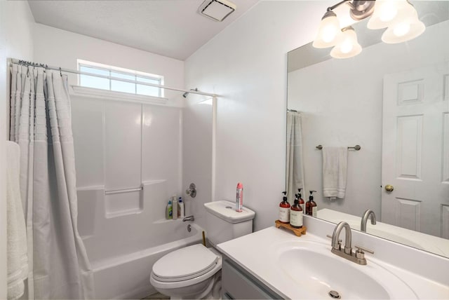 full bathroom featuring shower / tub combo with curtain, vanity, and toilet