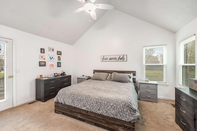 bedroom featuring light carpet, high vaulted ceiling, and ceiling fan