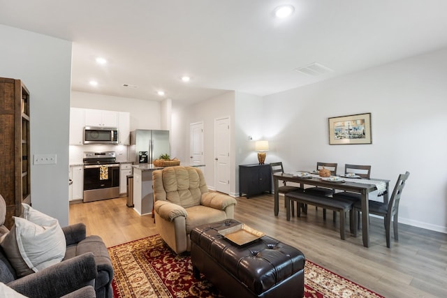 living room featuring light hardwood / wood-style floors