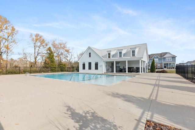 view of swimming pool featuring a patio area