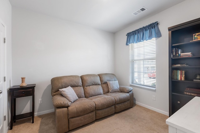 living room with light colored carpet