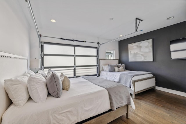 bedroom featuring wood-type flooring