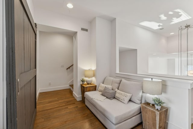 living area with wood-type flooring