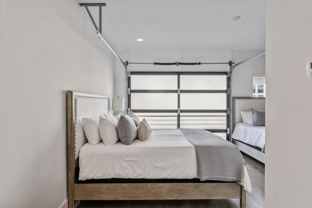 bedroom featuring wood-type flooring