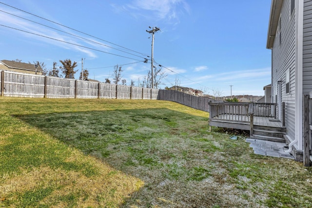 view of yard with a wooden deck