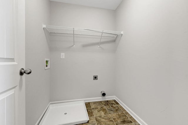 laundry room featuring electric dryer hookup and washer hookup