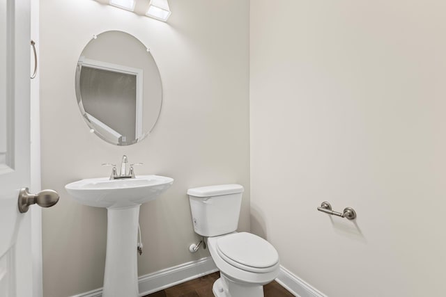1249 June Wilde Rdg, Spring Hill, TN 37174 - bathroom featuring baseboards and wood finished floors