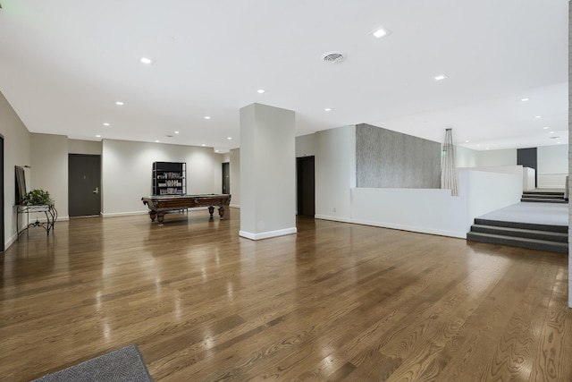 living room featuring hardwood / wood-style flooring and pool table