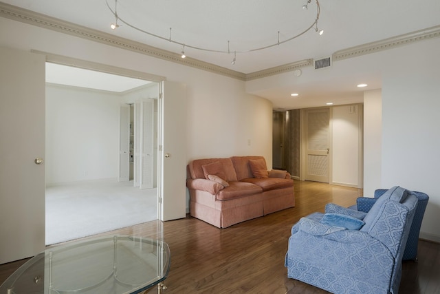 living room with crown molding, track lighting, and dark hardwood / wood-style floors