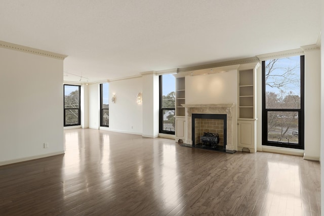 unfurnished living room with hardwood / wood-style floors