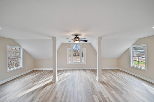 bonus room with light wood-type flooring and a wealth of natural light