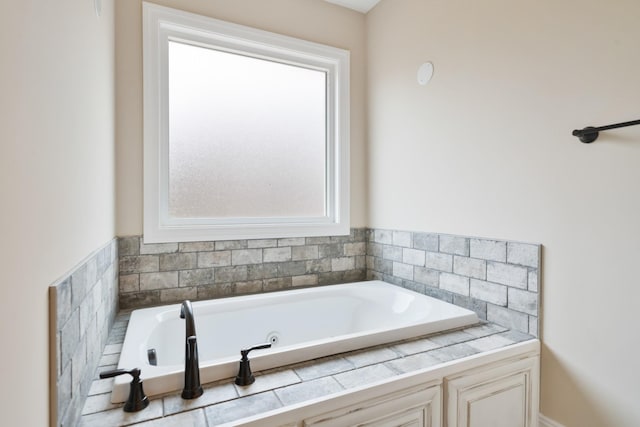 bathroom featuring a washtub