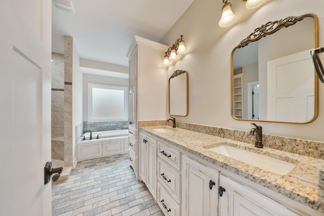 bathroom featuring a bathtub and vanity