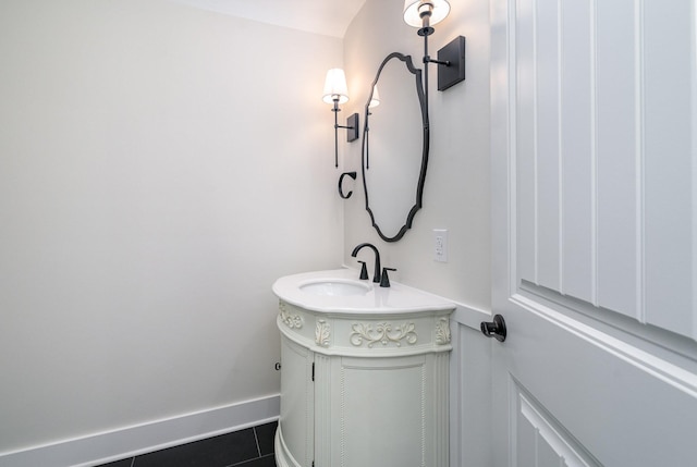 bathroom with tile patterned flooring and sink