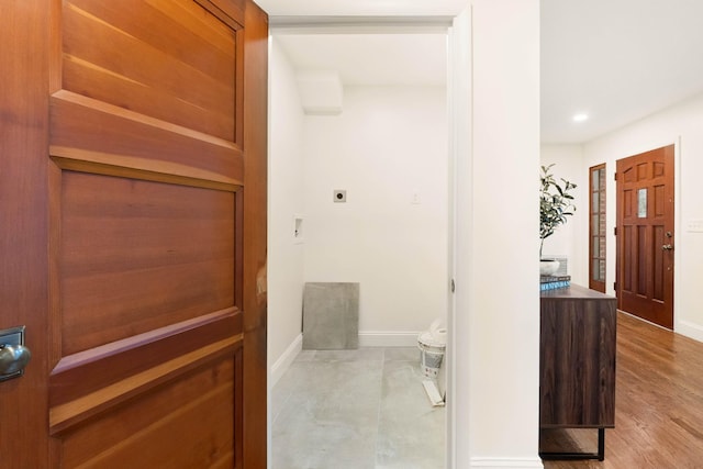 bathroom with hardwood / wood-style floors