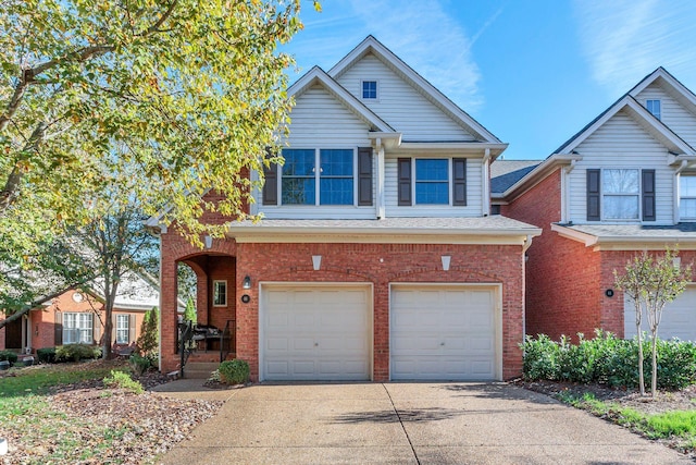 view of front of property with a garage