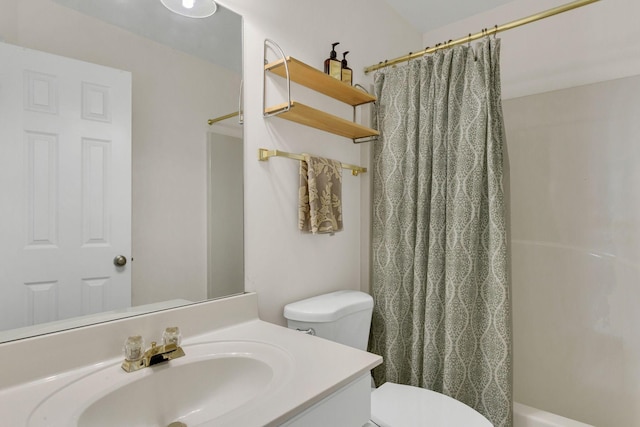 full bathroom featuring vanity, toilet, and shower / bath combo with shower curtain