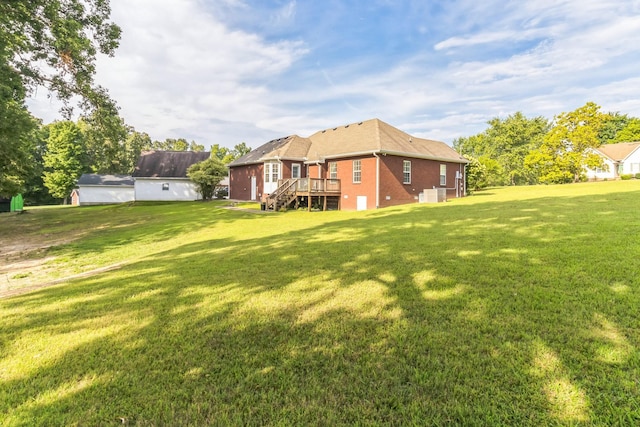 view of yard with a deck