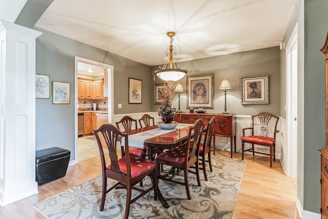 dining room featuring light hardwood / wood-style floors