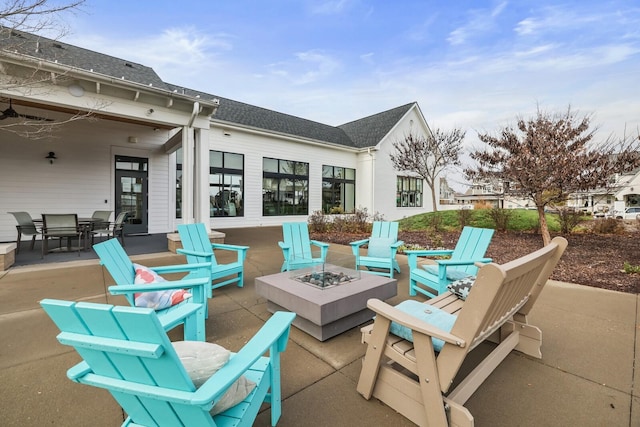 view of patio / terrace with an outdoor fire pit