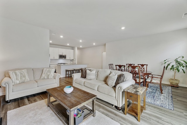 living room with light wood-type flooring