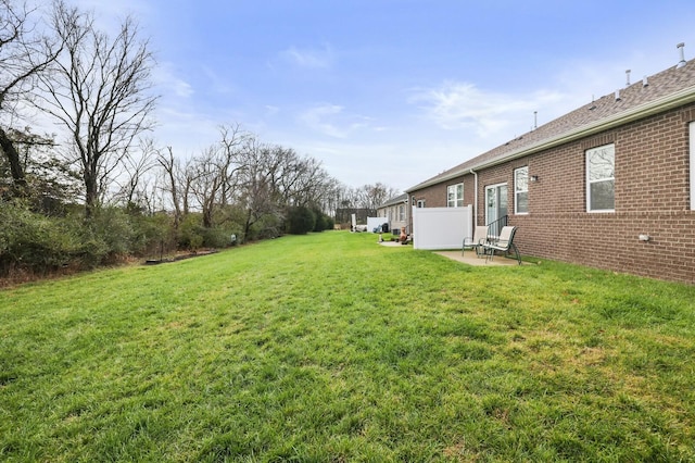 view of yard with a patio area