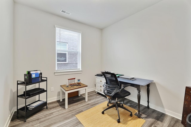 office space featuring hardwood / wood-style floors