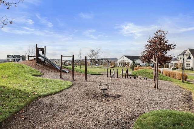 view of playground with a yard