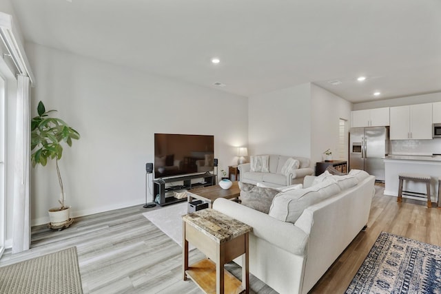 living room featuring light hardwood / wood-style flooring