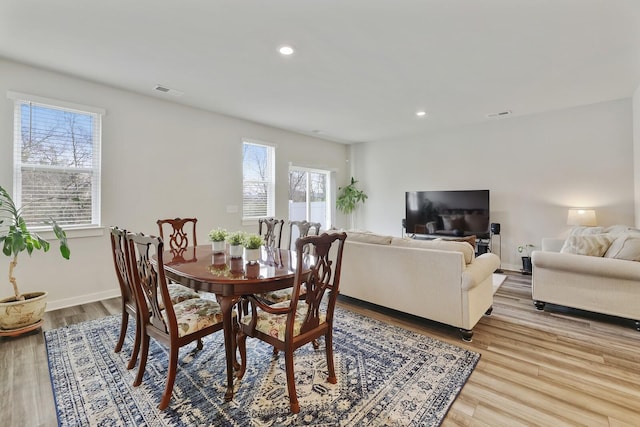 dining area with light wood-type flooring