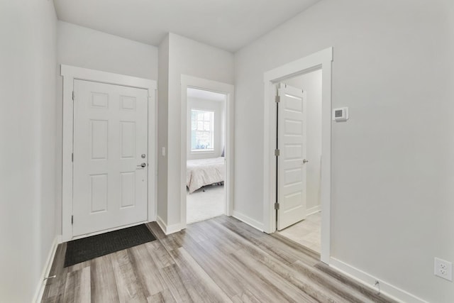 foyer entrance featuring light hardwood / wood-style floors