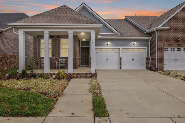 view of front of property featuring a garage