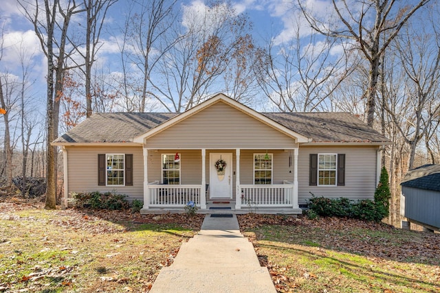 ranch-style house with covered porch