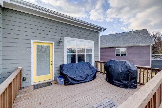 wooden deck with grilling area