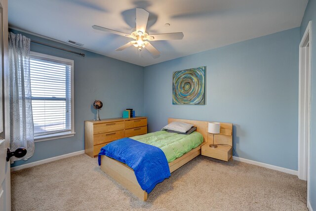 bedroom featuring carpet and ceiling fan