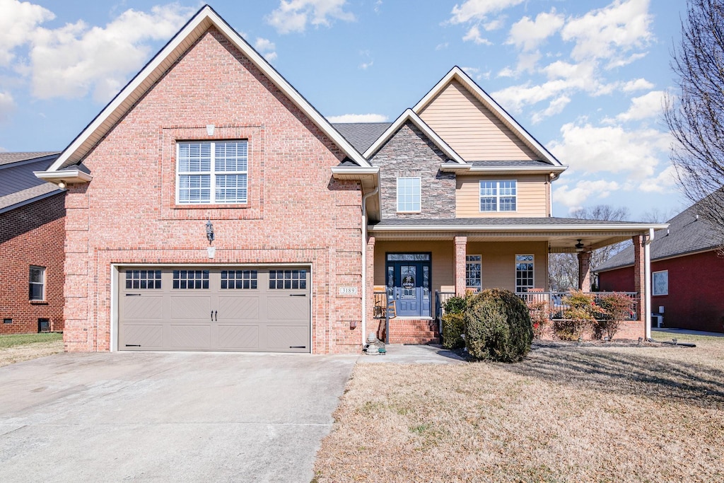 view of front of home featuring a garage and covered porch