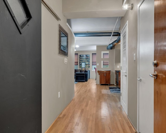 corridor featuring light wood-type flooring