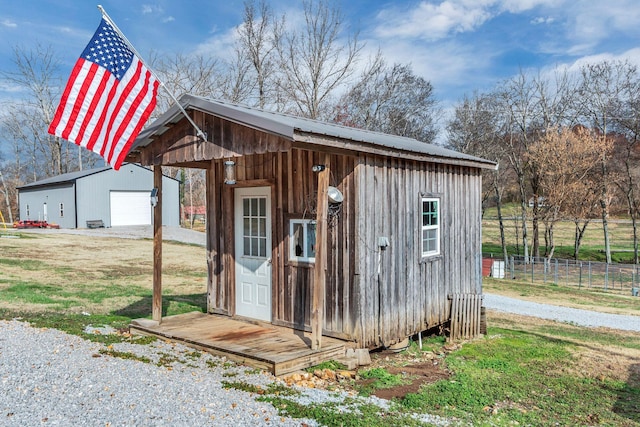 view of outbuilding featuring a garage